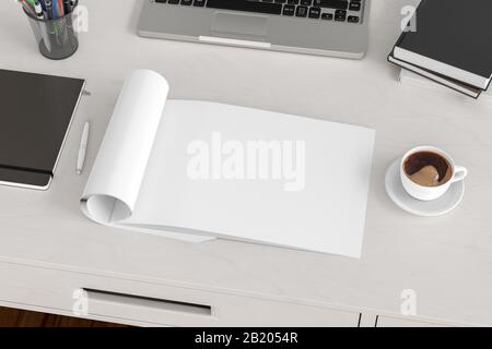 Blank horizontal right magazine page. Workspace with folded magazine mock up on white desk with cup of coffee. Side view Stock Photo