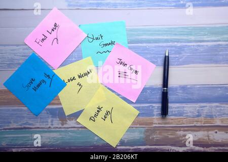 top view new year goals written on sticky notes on table  Stock Photo