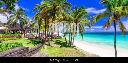 Tropical vacation and luxury resorts of Mauritius island. beautiful beach belle Mare Stock Photo