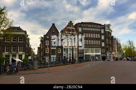 Amsterdam under spring cloudy sky Stock Photo