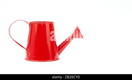 Red watering can on white background Stock Photo