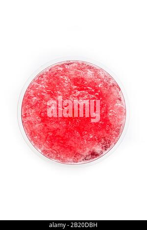 Red slushie in plastic cup isolated on white background Stock Photo