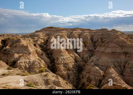 SD00230-00....SOUTH DAKOTA - Weathered and eroded, layered butte viewed from the Conata Basin Overlook in Badland National Park. Stock Photo