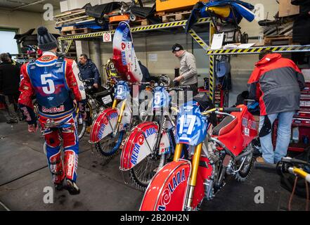 Berlin, Germany. 28th Feb, 2020. After the training for the Ice Speedway Team World Championship, motorcycles are in a paddock. Credit: Christophe Gateau/dpa/Alamy Live News Stock Photo