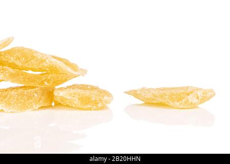 Lot of slices of dried yellow pineapple isolated on white background Stock Photo