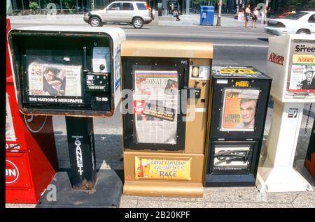 Street self service newspaper stands in Toronto, Canada. Stock Photo