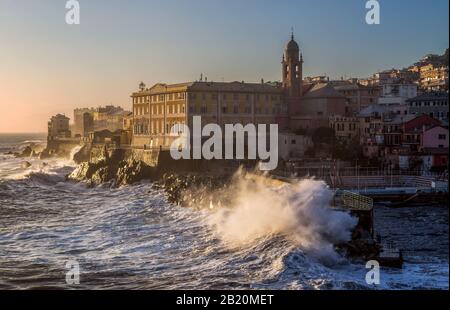 Big stormy waves crashing over the pier, Genoa (Genova) Nervi, Italy. Stock Photo