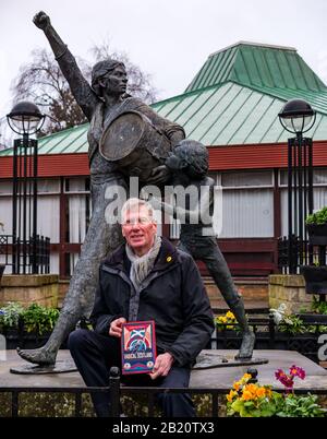 Tranent, East Lothian, Scotland, United Kingdom, 28th February 2020. Kenny MacAskill, recently elected SNP Member of Parliament for East Lothian, publishes a new book on February 27th 2020 (Biteback Publishing) called 'Radical Scotland'. One chapter describes the Tranent Massacre in 1797 in which Jackie Crookston, featured in the sculpture by David Annand behind him, was killed Stock Photo