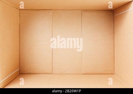 Empty cardboard box, inside view. Empty space for cargo, parcel and gift. Stock Photo