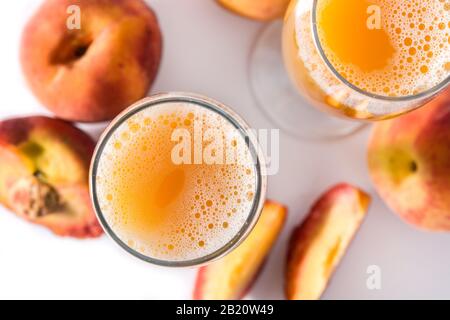 Bellini champagne cocktail isolated on white background Stock Photo - Alamy