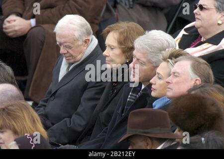 Washington, D.C. 20JAN05:  Capitol ceremony for the swearing in of President Bush for his second term. Attending are (l-r) former president and first lady Jimmy and Rosalynn Carter and Bill and Hillary Clinton, and former vice president Dan Quayle.. ©Bob Daemmrich Stock Photo