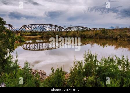 Historic Gillespie Dam Bridge and Gila River, Arizona Stock Photo
