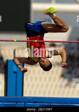 Athens, Greece: China's Bin Hou clears the high jump in the F42 class to win in 1.77 meters. September 23, 2004 ©Bob Daemmrich Stock Photo