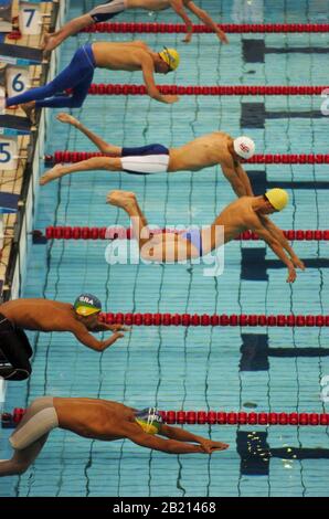 Athens, Greece  18SEP04: Start of men's 100 meter freestyle prelim heat. ©Bob Daemmrich Stock Photo