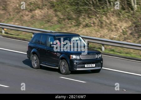 OE61DLF Land Rover Range Rover Sport Abio Sport Sdv6 Black Car Diesel driving on the M6 motorway near Chorley in Lancashire, UK Stock Photo