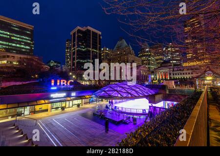 Downtown Vancouver, British Columbia, Canada - Feb 22, 2020: Night View of Robson Square Ice Rink in the City during Night after winter sunset. Stock Photo
