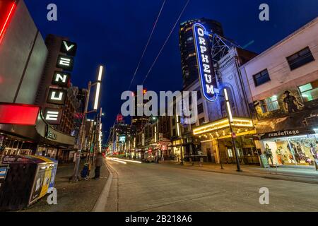 Downtown Vancouver, British Columbia, Canada - Feb 22, 2020: Night View of a Main Strip in the Modern Urban City, Granville St, where most nightclubs Stock Photo