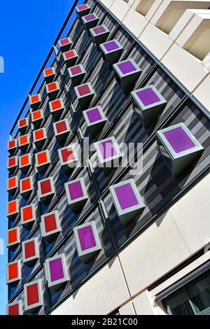 Moxy Hotel building brand of Marriot International colourful windows panels on new build close to station Stratford Newham East London England UK Stock Photo