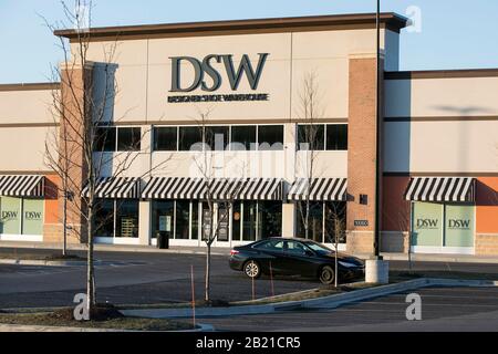 A logo sign outside of a Designer Shoe Warehouse (DSW) retail store location in Owings Mills, Maryland on February 21, 2020. Stock Photo