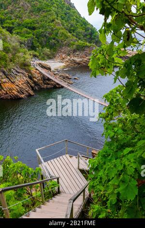 Suspension bridge at Storms River Mouth,Tsitsikamma National Park, Garden Route, near Port Elizabeth,South Africa Stock Photo