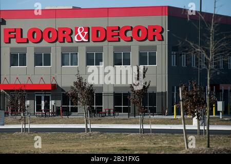 A logo sign outside of a Floor & Decor fulfillment center in Baltimore,  Maryland on February 22, 2020. (Photo by Kristoffer Tripplaar/Sipa USA  Stock Photo - Alamy