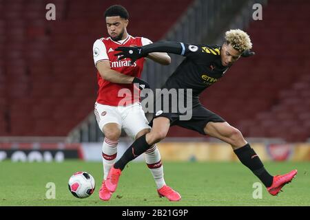 London, UK. 28th Feb, 2020.    Trae Coyle of Arsenal u23 and Felix Nmecha of Manchester City u23 battling for possession during the Premier League 2 match between Arsenal Under 23 and Manchester City Under 23  at the Emirates Stadium, London on Saturday 29th February 2020. (Credit: Jacques Feeney | MI News) Photograph may only be used for newspaper and/or magazine editorial purposes, license required for commercial use Credit: MI News & Sport /Alamy Live News Stock Photo