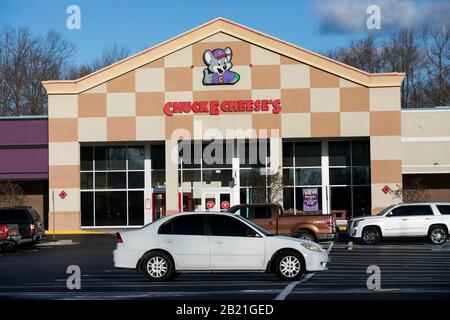 A logo sign outside of a Chuck E. Cheese restaurant location in Waldorf, Maryland, on February 27, 2020. Stock Photo