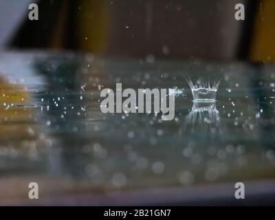 raindrops on a table Stock Photo