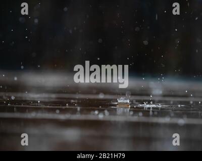 raindrops on a table Stock Photo