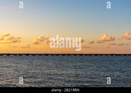 View of a bridge in the island of Cozumel at sunset Stock Photo