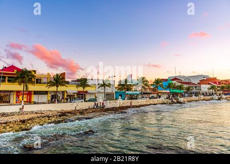 Cozumel, Quintana Roo, Mexico - February 4, 2019: View of the main streets of San Miguel, with its colorful buildings, in the tropical island of Cozum Stock Photo