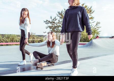 Best friends. Modern fashion. Kids fashion. Little girls wearing rainbow  clothes. Happiness. Girls long hair. Cute children same outfits  communicating. Trendy and fancy. Emotional kids. Fashion shop Stock Photo -  Alamy