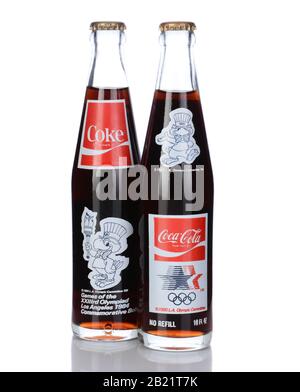 IRVINE, CA - January 05, 2014: 2 Commemorative Bottles of Coca Cola from the 1984 Los Angeles Olympic Games. The front and back of the bottles are sho Stock Photo