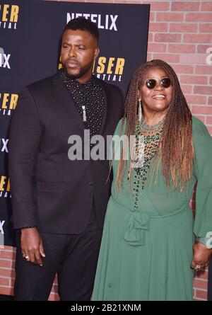WESTWOOD, CA - FEBRUARY 27: Winston Duke and Cora Pantin attend the Premiere of Netflix's 'Spenser Confidential' at Regency Village Theatre on February 27, 2020 in Westwood, California. Stock Photo