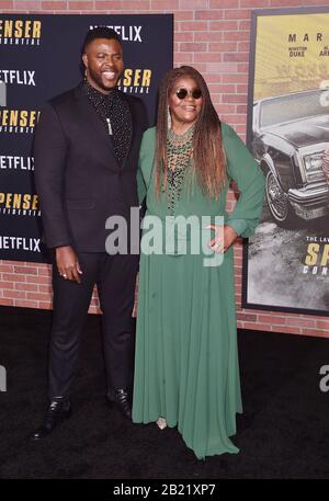 WESTWOOD, CA - FEBRUARY 27: Winston Duke and Cora Pantin attend the Premiere of Netflix's 'Spenser Confidential' at Regency Village Theatre on February 27, 2020 in Westwood, California. Stock Photo