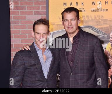WESTWOOD, CA - FEBRUARY 27: Peter Berg (L) and Scott Stuber attend the Premiere of Netflix's 'Spenser Confidential' at Regency Village Theatre on February 27, 2020 in Westwood, California. Stock Photo