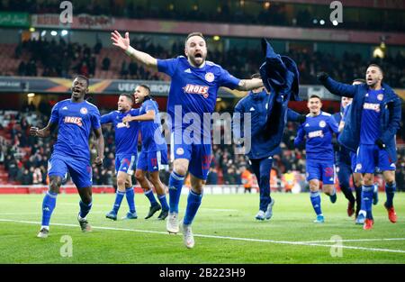 London, UK. 27th Feb, 2020. Mathieu Valbuena of Olympiacos celebrates they win after Europa League Round of 32 2nd Leg between Arsenal and Olympiakos at Emirates stadium, London, England on 27 February 2020. (Photo by AFS/Espa-Images) Photo via Credit: Newscom/Alamy Live News