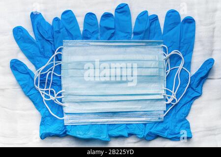 Download Blue Medical Glove And Face Masks On Yellow Covid Stock Photo Alamy PSD Mockup Templates