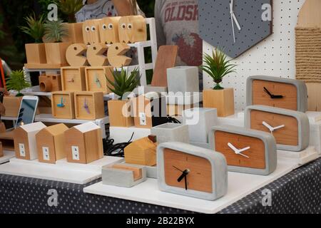 NAKHON RATCHASIMA, THAILAND - NOVEMBER 24 : Decoration wood toy and wooden clock handmade shop for sale travelers people buy at street market on Novem Stock Photo