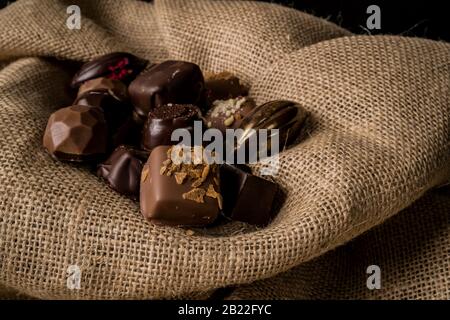 Homemade Belgian chocolates on dark background Stock Photo