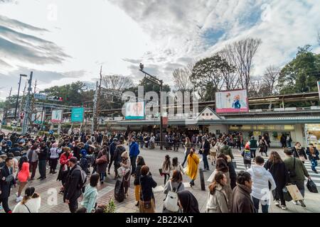 TOKYO, JAPAN - FEB 2019 : Undefined people and tourist crowd visiting and enjoying the trendiest fashion at Takeshita street at Harajuku station on Fe Stock Photo