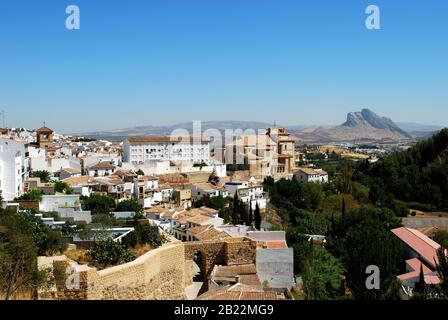 View over the town featuring Carmen church (Iglesia del Carmen) with the lovers mountain to the rear, Antequera, Andalusia, Spain. Stock Photo