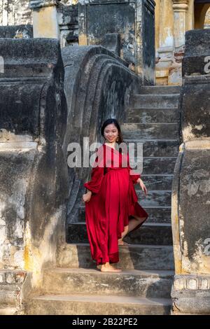 Young Burmese woman posing for photograph at Maha Aungmye Bonzan Monastery, Inwa, Mandalay Region, Myanmar Stock Photo