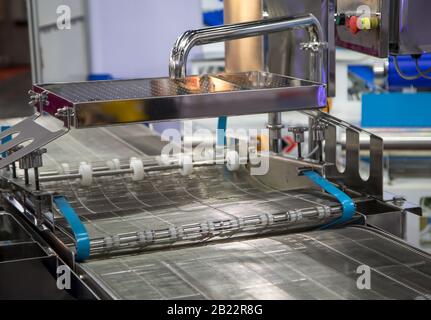 Empty wire belt conveyor in production line in food industry Stock Photo