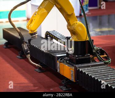Automatic robotic welding arm in modern factory Stock Photo