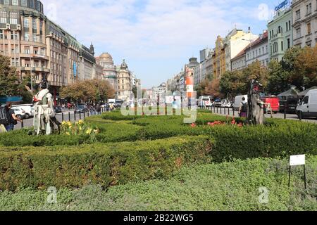 There is multiple statues in Prague main street. The architectural style is beautiful Stock Photo