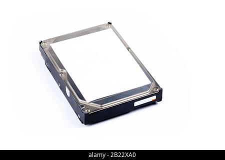 Simple 3.5 inch hdd, hard drive with empty blank label isolated on white background, copy space, object cut out. Hard disk data storage access and rec Stock Photo