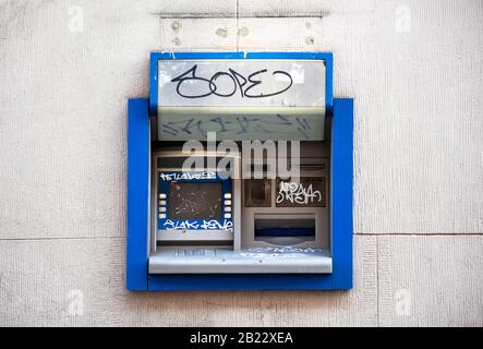 Damaged, vandalised, abandoned ghost ATM, out of order destroyed cash machine, front view of an broken, out of service auto teller machine Stock Photo