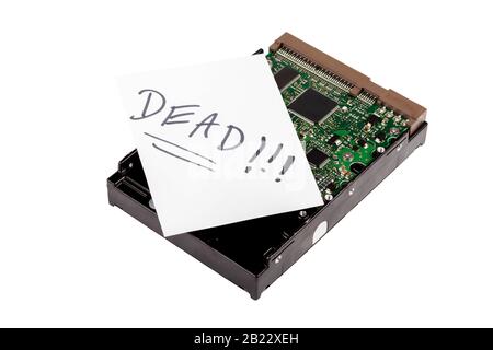 Dead labeled hard drive, broken hdd disk with corrupted data, object isolated on white. Damaged, not working 3.5 hard disc with a label. Data loss Stock Photo