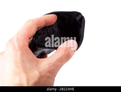 Hand holding, opening a simple black wallet, fingers spreading open and showing an empty wallet gesture. No money left, being poor, poverty Stock Photo